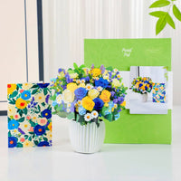 Mini-Cerulean-Dream-small-paper-pop-up-bouquet-of-blue-and-gold-roses-—-PetalPal