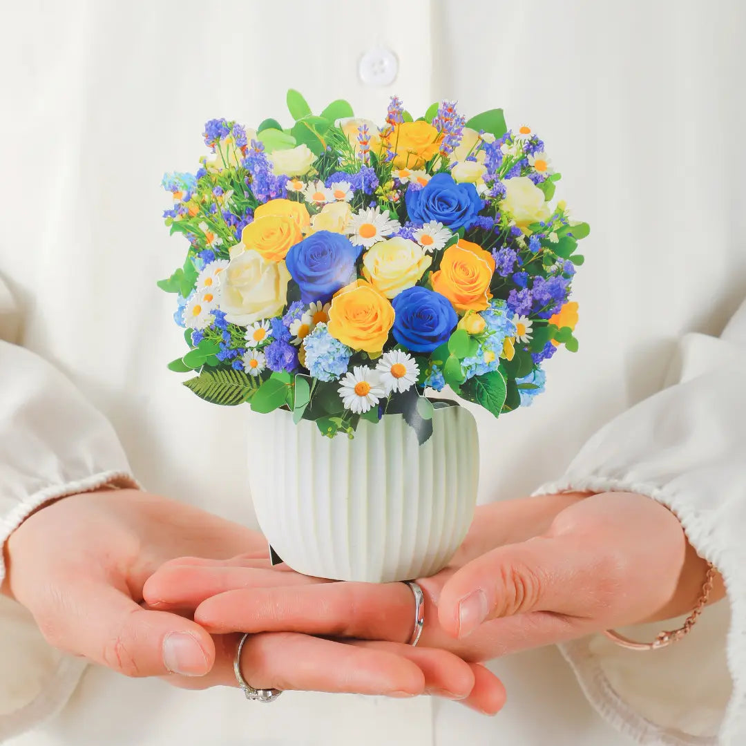 Mini-Cerulean-Dream-small-paper-pop-up-bouquet-of-blue-and-gold-roses-—-PetalPal